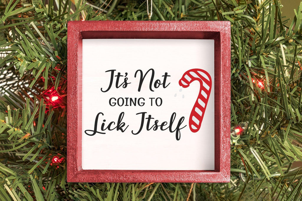 http://sofontsy.com/cdn/shop/products/adult-christmas-svg-design-its-not-going-to-lick-itself-candy-cane-so-fontsy-svg-crafting-after-dark-494781_1024x1024.jpg?v=1616875423