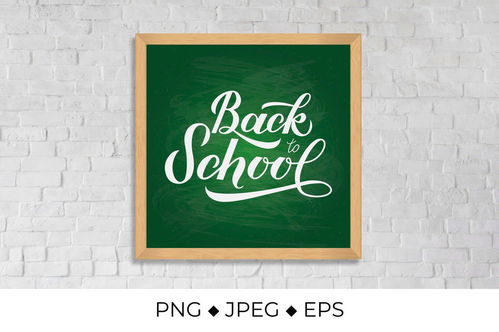 Back to school calligraphy hand lettering on green board with wooden ...