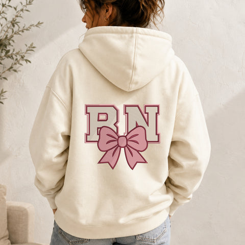 EF645. RN Coquette Pink Bow - White_Hoodie.jpg