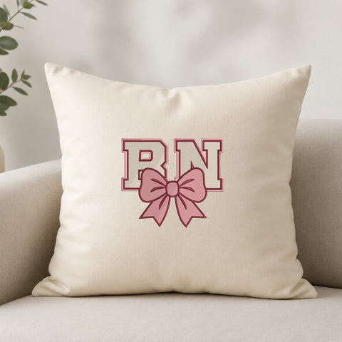 EF645. RN Coquette Pink Bow - White_Pillow.jpg
