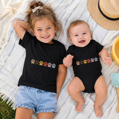 EF686. Dog Paw Prints Line Border - Black_Kids_tshirt_And_onesie.jpg