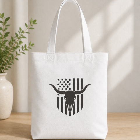 EF730. Western Longhorn Skull American Flag - White_Totebag.jpg