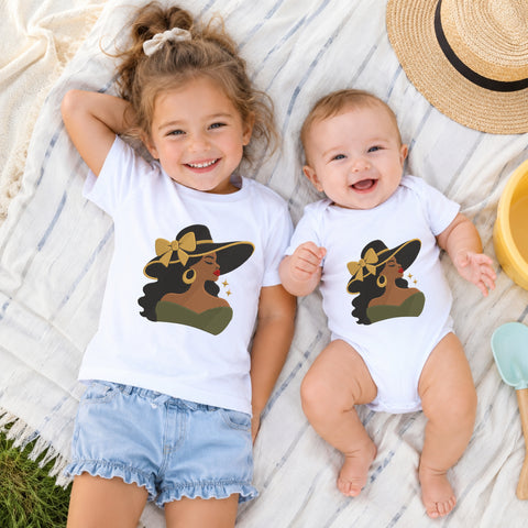EF736. Black Woman Sun Hat Gold Bow - White_Kids_tshirt_And_onesie.jpg