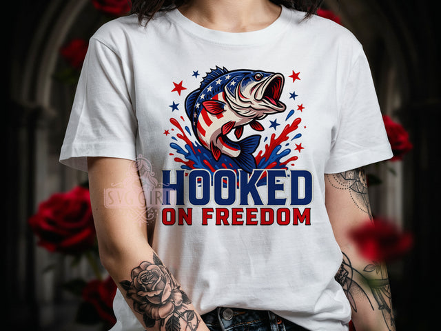 TS190626025 Hooked On Freedom T-Shirt PNG, Patriotic Bass, American Flag Fish, Sublimation PNG, Independence Day Shirt, Fishing Pride, Red White BlueA.jpg