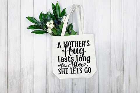 A mothers hug lasts long after she lets go SVG Design SVG Designangry 