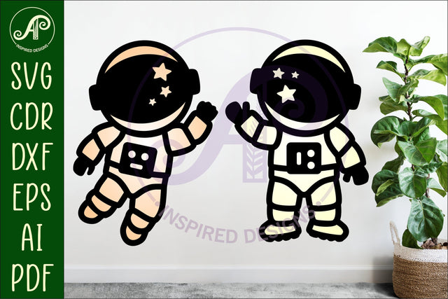 Astronaut with star helmet designs two layer cut out SVG APInspireddesigns 