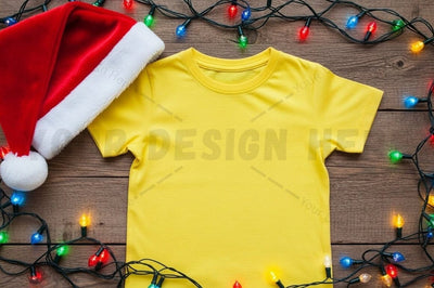 Bright yellow t-shirt with santa hat and christmas lights Mock Up Photo Designangry 