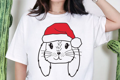 Bunny Santa hat svg file, Bunny with Hat svg, Christmas svg file, Lop Rabbit svg, Christmas cut file, Christmas Santa hat, Bunny Christmas SVG DesignDestine 