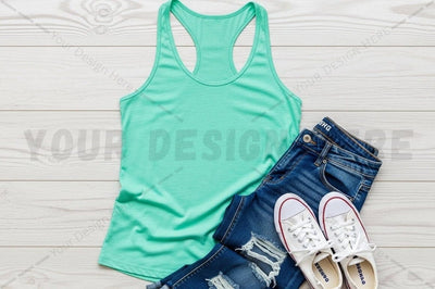 Casual summer outfit with mint green tank top, distressed denim shorts, and white sneakers Mock Up Photo Regulrcrative 