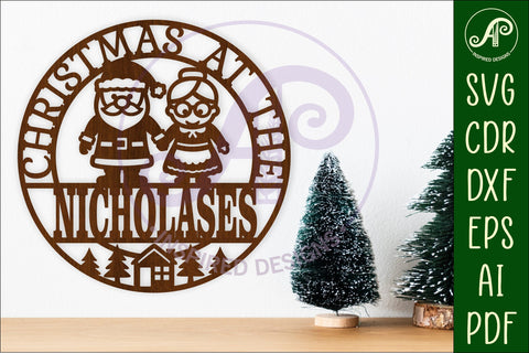 Christmas at the Family name sign laser cut Santa and Mrs C SVG APInspireddesigns 