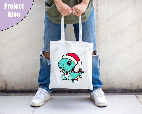 Christmas Dinosaur, Santa Dino, Holiday T Rex SVG, PNG, Sublimation, Clipart, Dinosaur Christmas Lights SVG Lavender Paper Cut 