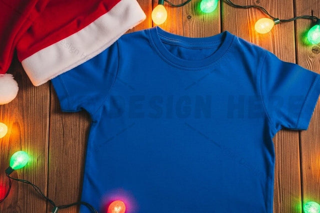 Christmas-themed blue t-shirt mockup Mock Up Photo Designangry 