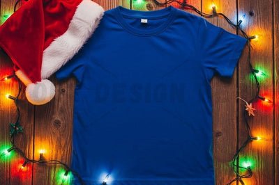 Christmas-themed blue t-shirt mockup Mock Up Photo Designangry 