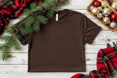 Christmas-themed brown t-shirt mockup Mock Up Photo Designangry 
