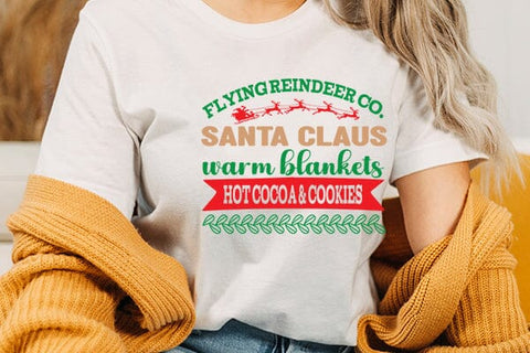 Flying reindeer co. santa claus warm blankets hot cocoa & cookies SVG Angelina750 