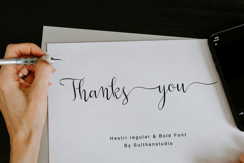 Hestri script Font Sulthan studio 