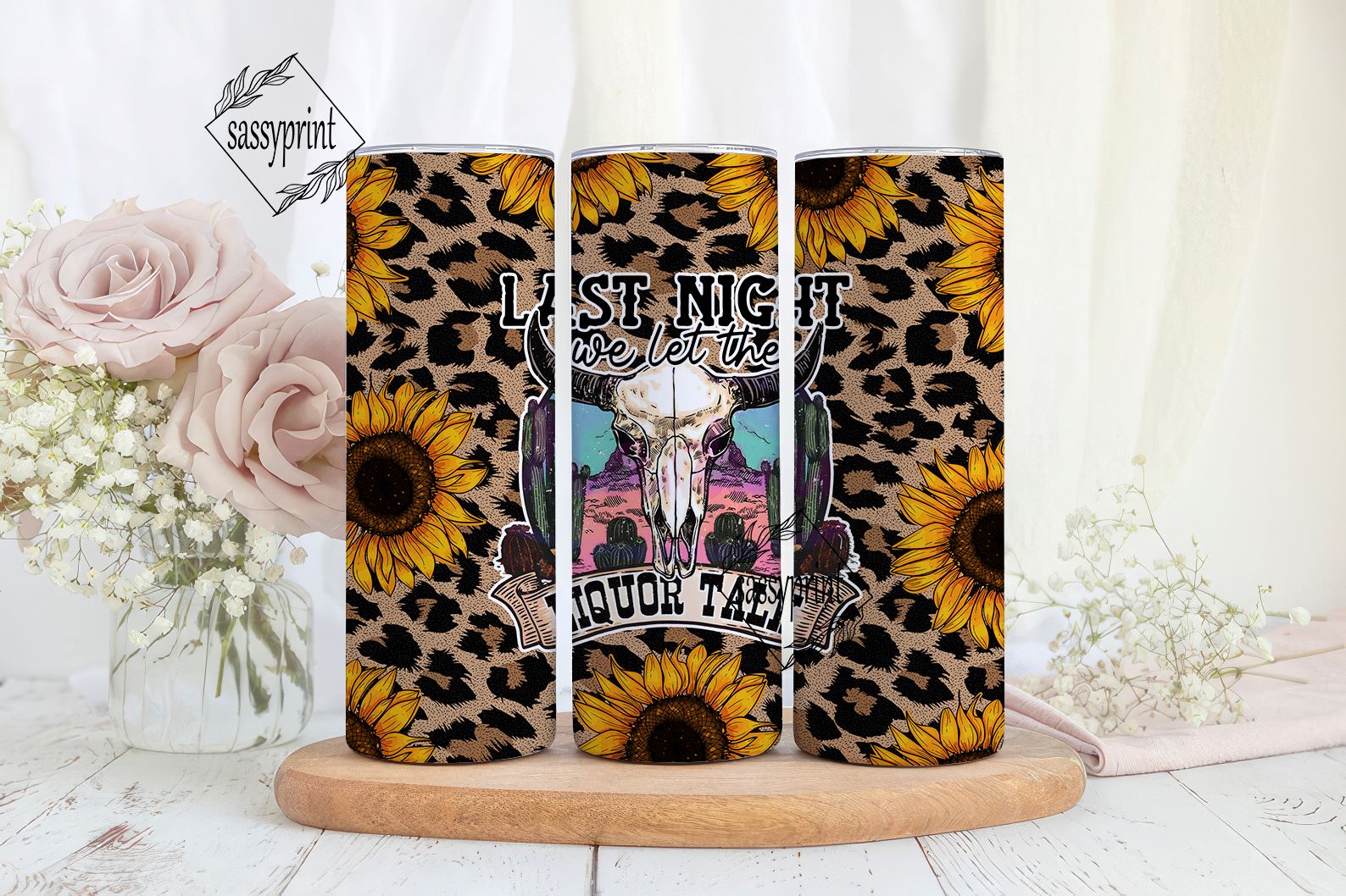 https://sofontsy.com/cdn/shop/files/last-night-we-let-the-liquor-talk-tumbler-wrap-western-cowhide-leopard-sunflowers-20-oz-skinny-tumbler-sublimation-designs-png-sublimation-sassyprint-828188_1588x.jpg?v=1700092247