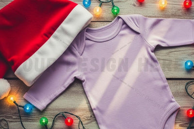 Lilac baby onesie with santa hat and christmas lights Mock Up Photo Designangry 