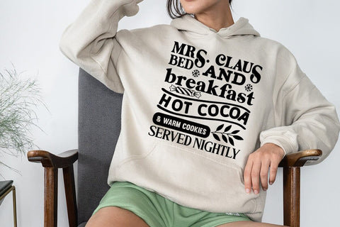 Mrs claus bed and breakfast hot cocoa & warm cookies served nightly SVG Angelina750 