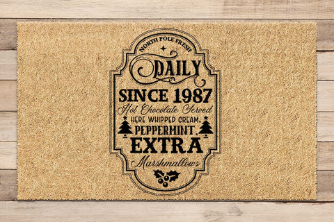 North pole fresh daily since 1987 hot chocolate served here whipped cream peppermint extra marshmallows SVG Angelina750 