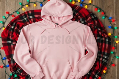 Pink hoodie on plaid blanket with christmas lights Mock Up Photo Designangry 
