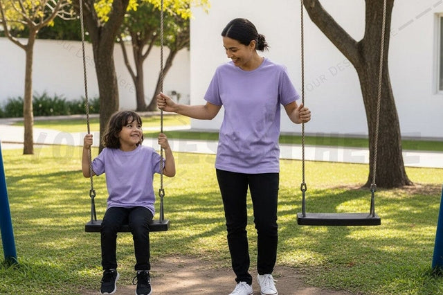 Purple t-shirt mockup design - mother and daughter playing on swings Mock Up Photo Regulrcrative 