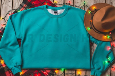 Teal t-shirt mockup with festive decorations Mock Up Photo Designangry 