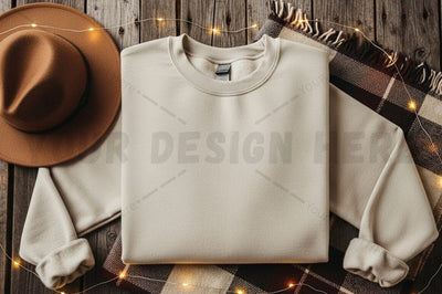White crew neck sweatshirt with brown hat and plaid blanket Mock Up Photo Designangry 