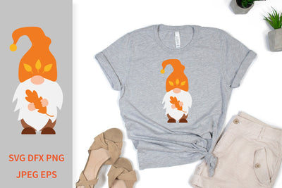 Autumn gnome. Cute gnome holding fall leaf SVG LaBelezoka 