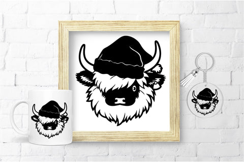 Christmas Highland Cow Face in Santa Hat SVG File SVG OrangeBrushStudio 