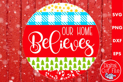 Christmas Round Sign Svg Door Hanger, Our Home Believes SVG Crafty Mama Studios 