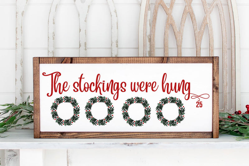 Christmas Stockings hung fireplace wreath hearth mantle digital sign svg cut files Cricut crafts art png dxf winter farmhouse designs SVG Farmstone Studio Designs 
