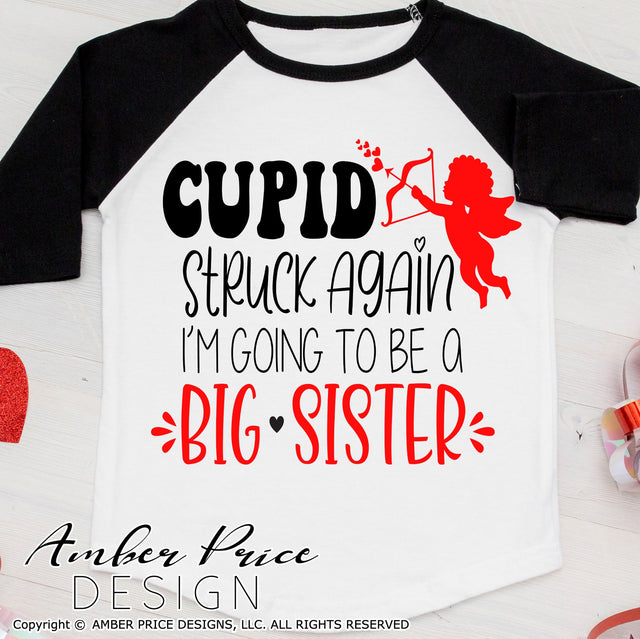 Cupid Struck Again SVG | Big Sister SVG | Valentine's Day Pregnancy Reveal SVG PNG DXF | Winter Maternity shirt SVG SVG Amber Price Design 