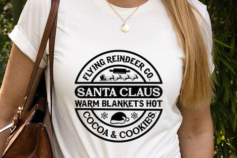 Flying reindeer co. santa claus warm blankets hot cocoa & cookies SVG Angelina750 