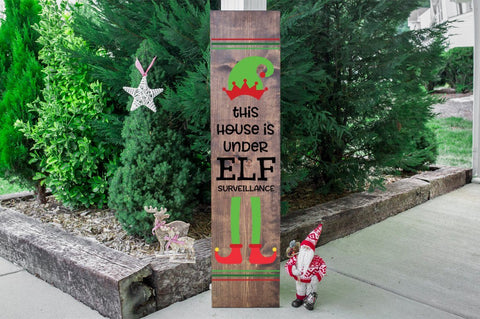Funny Vertical Front Porch Sign - This House Is Under Elf Surveillance SVG Pickled Thistle Creative 