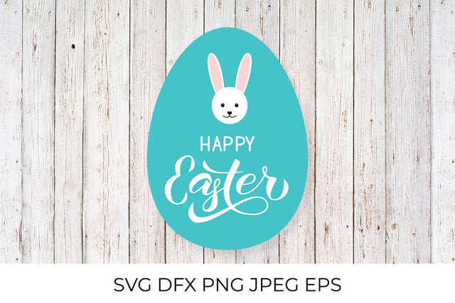 Happy Easter calligraphy lettering and cute cartoon bunny drawn on egg SVG LaBelezoka 