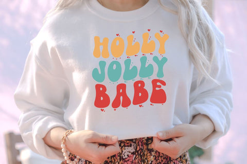 Holly jolly babe SVG SVG DESIGNISTIC 