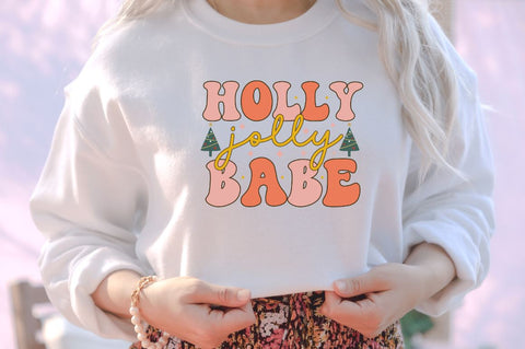 Holly jolly babe SVG SVG DESIGNISTIC 