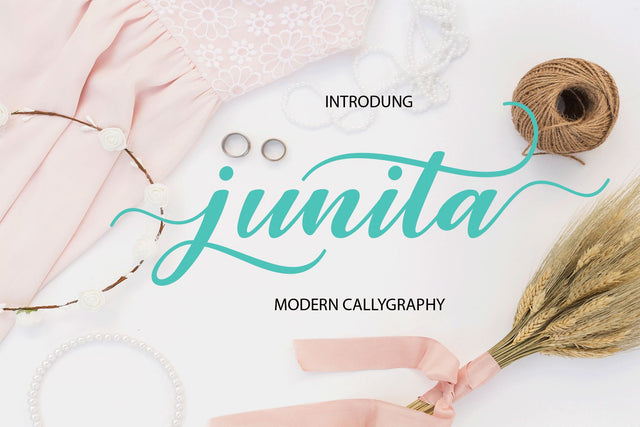 Junita Script Font mahyud creatif 