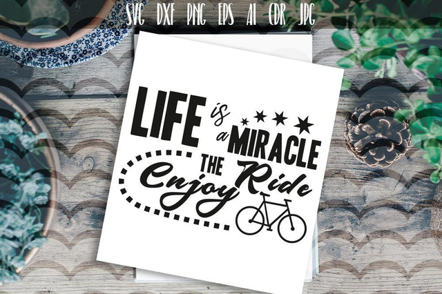 Life is miracle enjoy the ride typography SVG VectorSVGdesign 