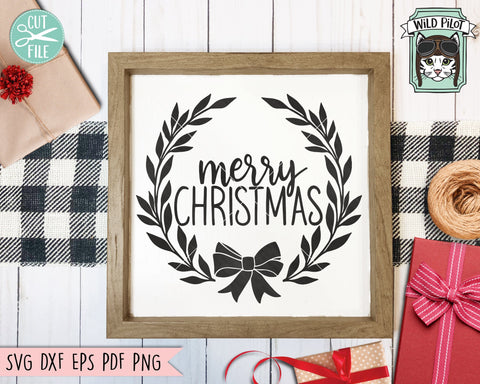 Merry Christmas Sign SVG File, Merry Christmas Cut File, Christmas Decor SVG, Laurel Leaves Sign SVG Cut File, Round Sign SVG, Hand Lettered Christmas SVG, Bow SVG SVG Wild Pilot 