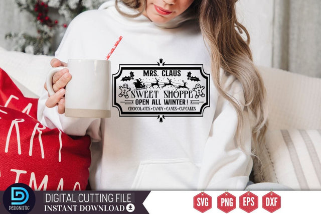 Mrs.Claus sweet shoppe open all winter ! chocolates candy canes cupcakes SVG SVG DESIGNISTIC 