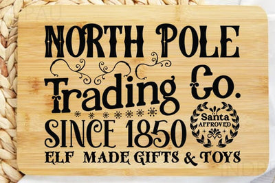 North Pole Trading Co.since 1850 Santa Approved Elf Made Gifts & Toys SVG Angelina750 