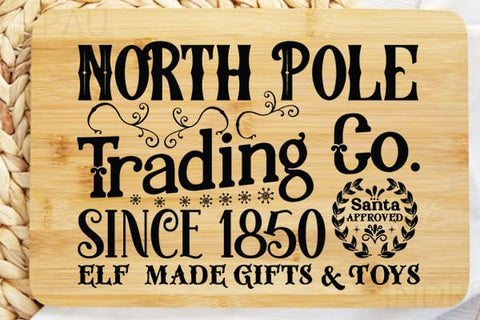 North Pole Trading Co.since 1850 Santa Approved Elf Made Gifts & Toys SVG Angelina750 