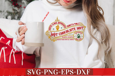Santa claus approved north pole hot chocolate 90.0000 N, 135.0000 W warm up here open all winter authentic since 1897 SVG SVG DESIGNISTIC 