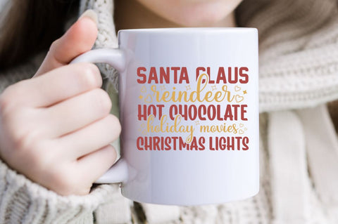 Santa claus reindeer hot chocolate holiday movies christmas lights SVG SVG DESIGNISTIC 