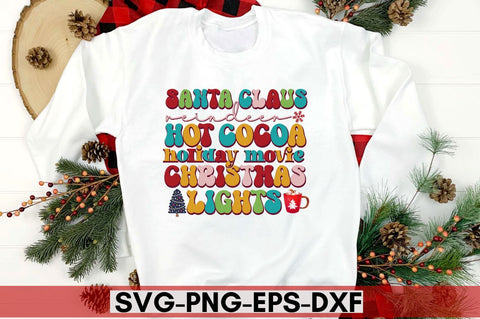Santa claus reindeer hot cocoa holiday movie christmas lights SVG SVG DESIGNISTIC 