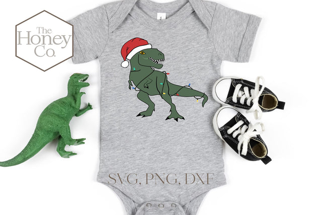 Santa T Rex SVG PNG DXF Christmas Dinosaur SVG The Honey Company 