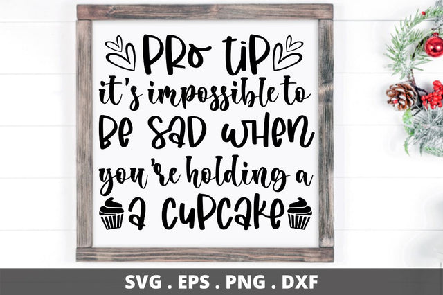 SD0008 - 22 pro tip it's impossible to be sad when you're holding a a cupcake SVG Designangry 