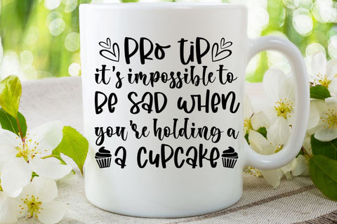 SD0008 - 22 pro tip it's impossible to be sad when you're holding a a cupcake SVG Designangry 